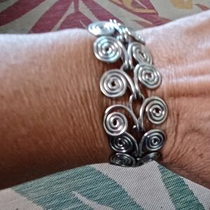 Elegant Silver Swirl Bracelet